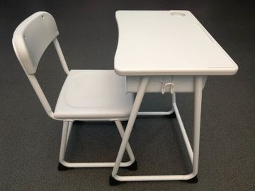 China A mesa e a cadeira ocas do estudante ajustaram-se com espaldar/tabela plásticos da parte superior fornecedor