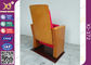 Cadeiras dobradas de madeira do auditório da mobília vermelha com almofada de escrita OEM/ODM de 32 quilogramas fornecedor