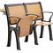 O ferro da faculdade ou da universidade de madeira dobra acima a cadeira com a tabela de escrita fixa fornecedor