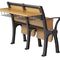 O ferro da faculdade ou da universidade de madeira dobra acima a cadeira com a tabela de escrita fixa fornecedor